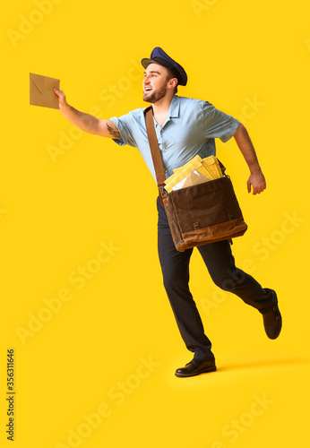 Handsome running postman on...
