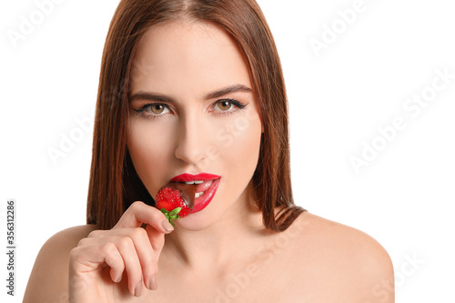 Sexy young woman with straw...
