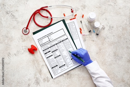 Hand of doctor with laborat...
