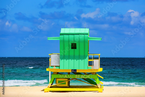 Sunny summer day, with blue sky and Atlantic Ocean. Miami Beach, Florida, USA sunrise and life guard tower. © Volodymyr