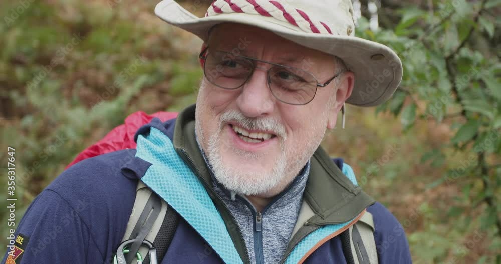 CU Mature hiker smiling / Yorkshire Moors, Yorkshire, UK CU Mature hiker smiling / Yorkshire Moors, Yorkshire, UK