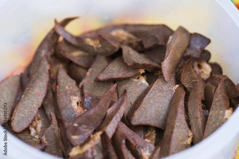 Obraz premium Close up of boiled Pork liver thai street food market
