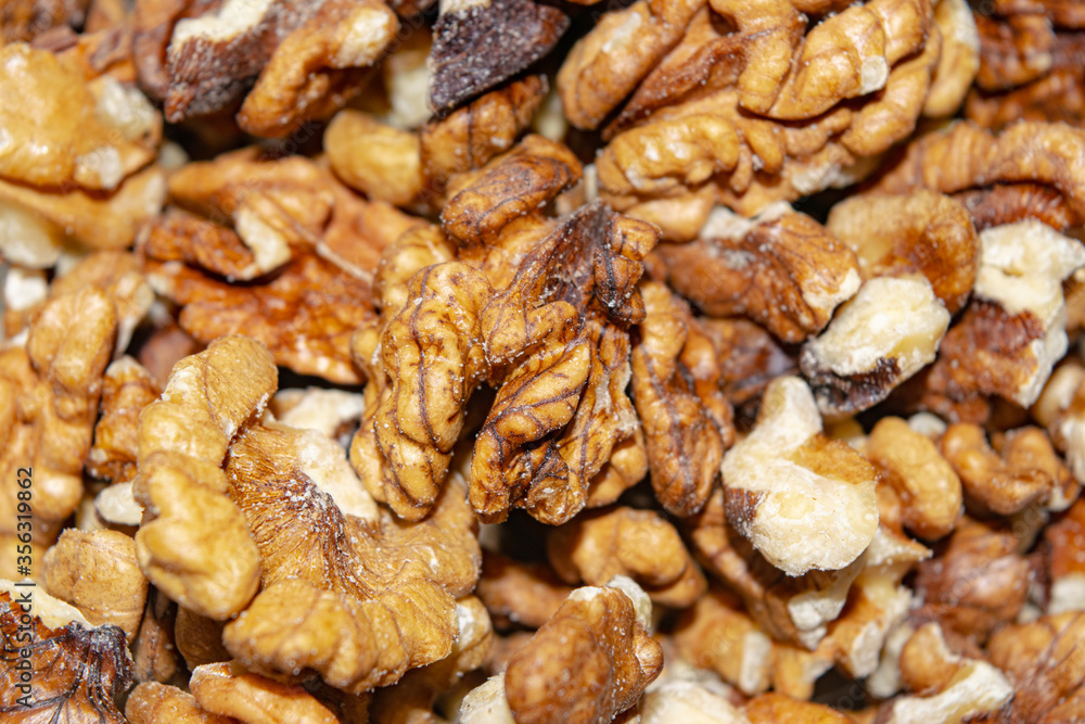 Peeled walnuts close-up. Surface texture. Healthy diet. Peeled walnuts close-up. Surface texture. Healthy diet.