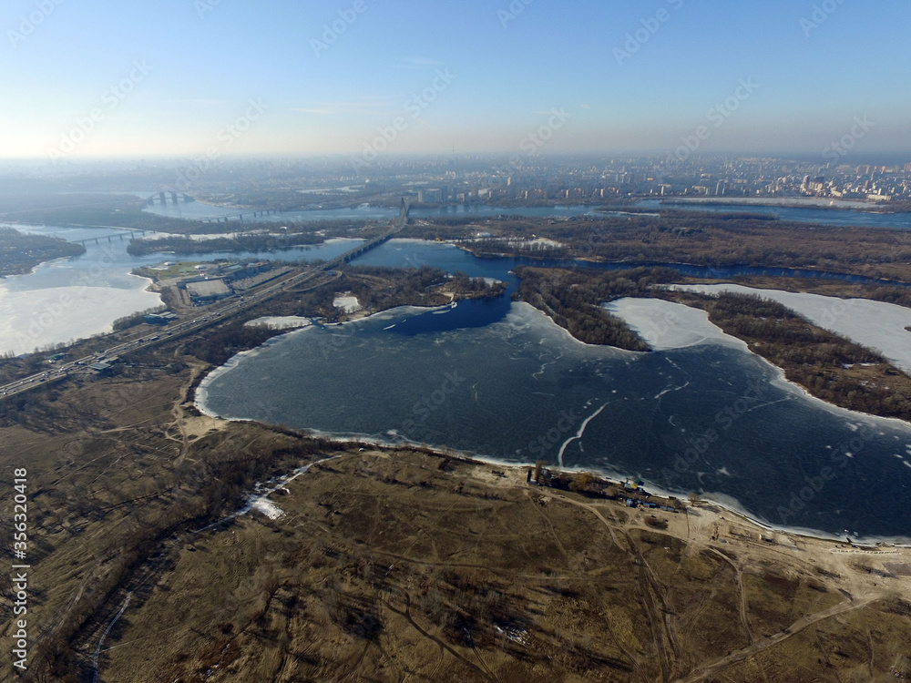 Aerial view of the Saburb landscape at winter time (drone image).  Near Kiev,Ukraine