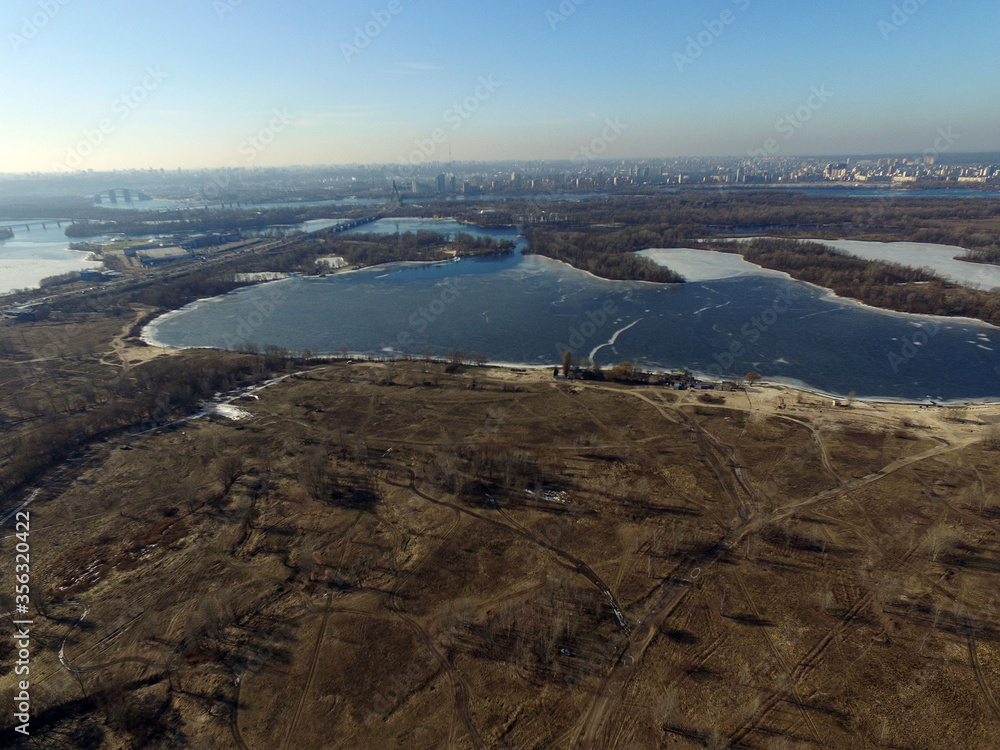 Aerial view of the Saburb landscape at winter time (drone image).  Near Kiev,Ukraine