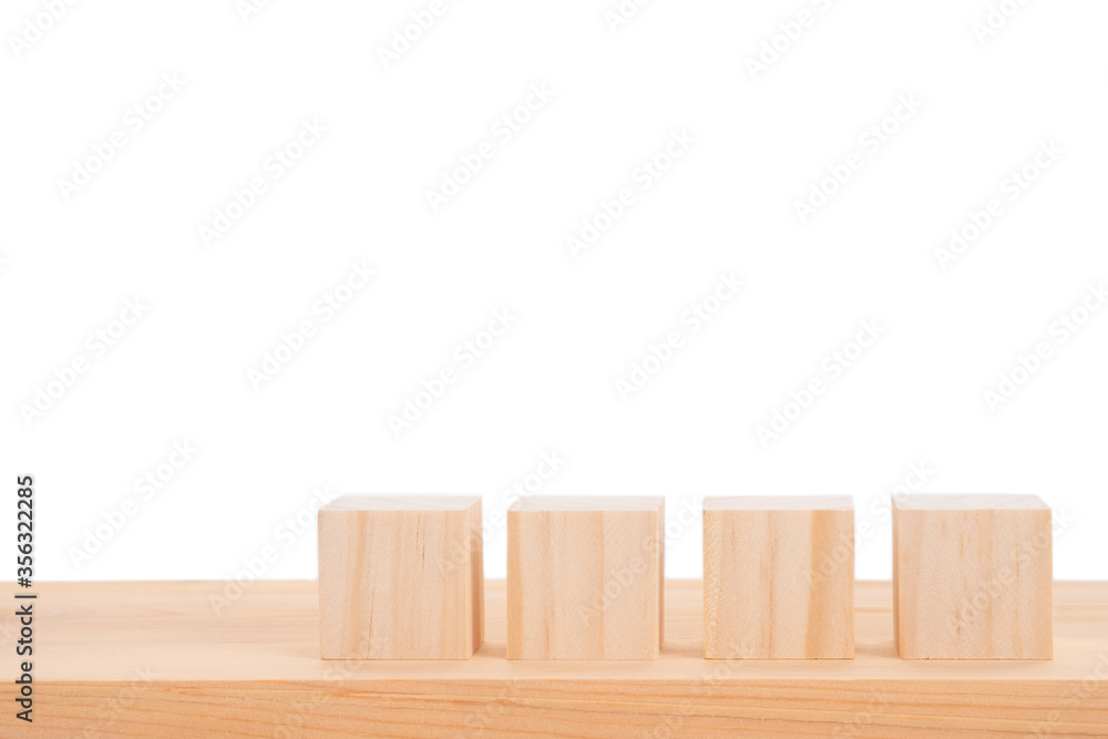 Blocks of wood isolated on white background. Strategy as a business plan for team work. Blocks of wood isolated on white background. Strategy as a business plan for team work.