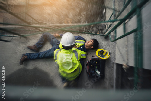 Stampa su tela Construction worker accident, Accidents at work, Builder accident fall scaffolding to the floor, Safety team help employee accident, Basic first aid training for support accident in site work
