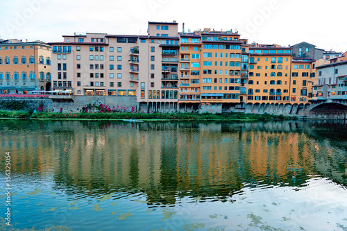 Scenic view of the Arno river, the main waterway of Tuscany region running through the medieval city of Florence in Italy