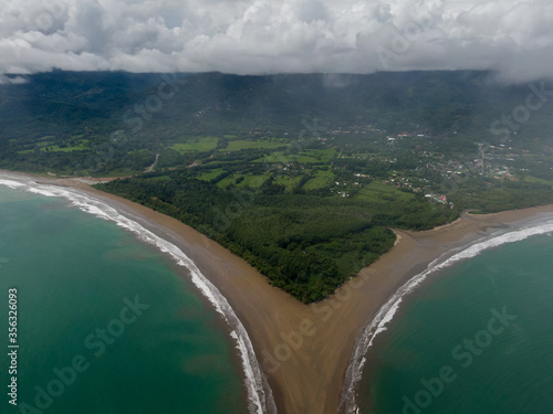 Beautiful aerial view of the majestic whale tale in the beach of the National park Marino Ballena in Costa Rica 