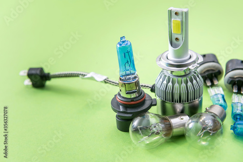 Halogen diod car bulb isolated on color background for repair. modent equipment for headlight photo