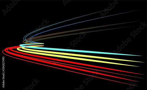 Car light trails over black background