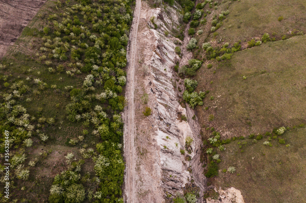 Aerial top view of rocks and tree, mountain ecosystem and healthy environment concept and background, Texture of green tree, stones and land Aerial top view of rocks and tree, mountain ecosystem and healthy environment concept and background, Texture of green tree, stones and land