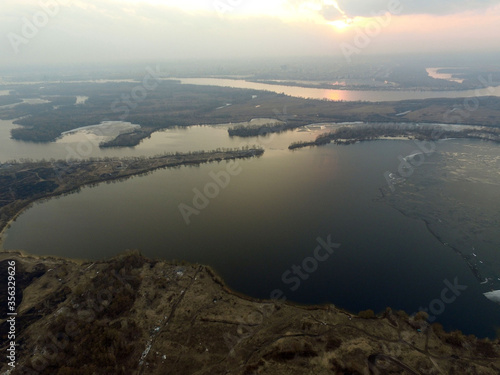 Aerial view of the countryside (drone image).Near river Desna.Winter time.Sunset. Kiev,Ukraine © Sergey Kamshylin