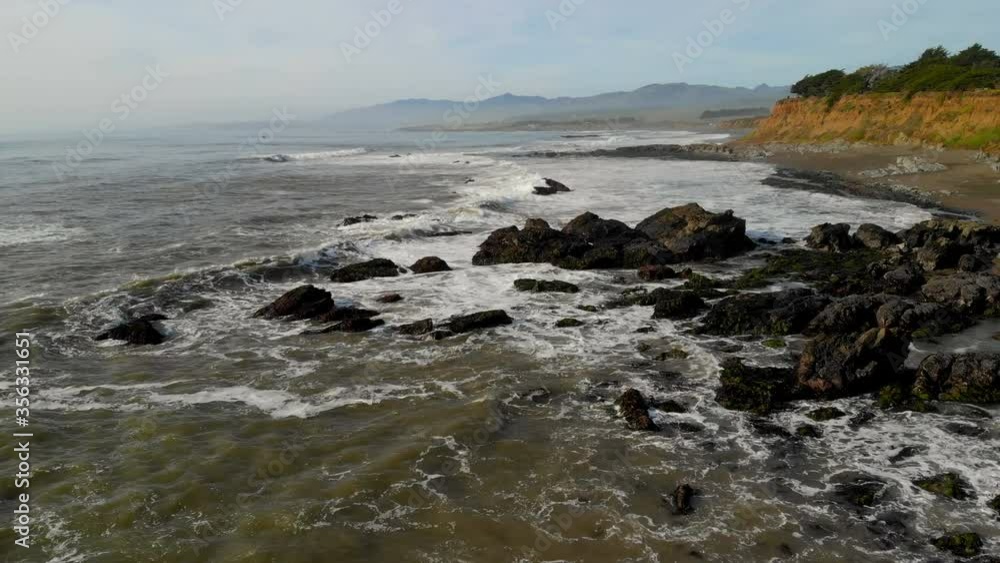 Aerial flyover of rugged coastline in Central Coast in California Aerial flyover of rugged coastline in Central Coast in California