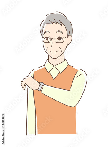 腕時計を見る男性