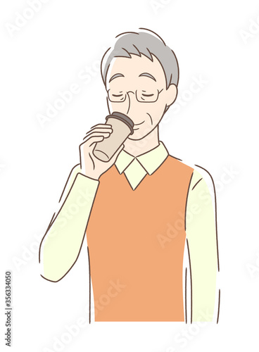 テイクアウトのコーヒーを飲む男性