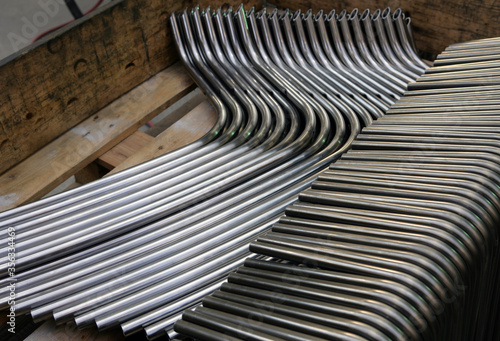 Bended metal pipes.. Office furniture production. Netherlands. Soldering © A