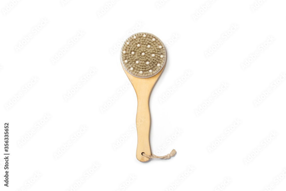 Fotografie Dry massage brush on a white background