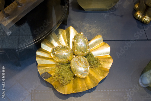 Gold easter eggs for sale in sovenir store photo