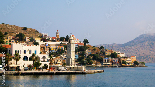 Symi town, Symi island, pictorial view of colorful houses and the harbour