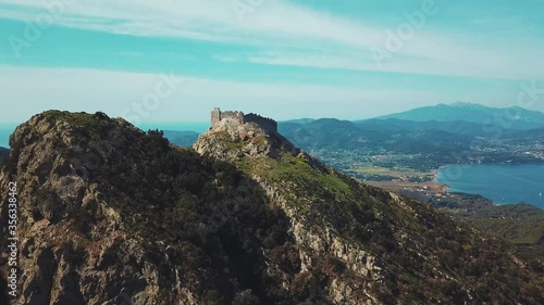 AERIAL WS Mountain landscape with ruins / Elba island, Tuscany, Italy