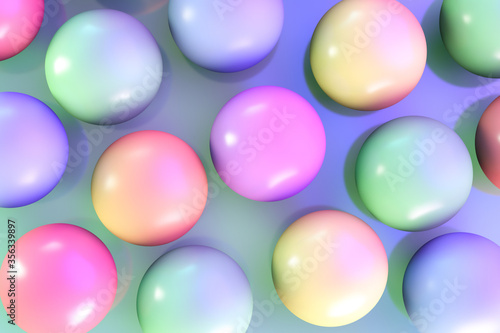 Multicolored glossy spheres on the surface. View from above. Abstract background.
