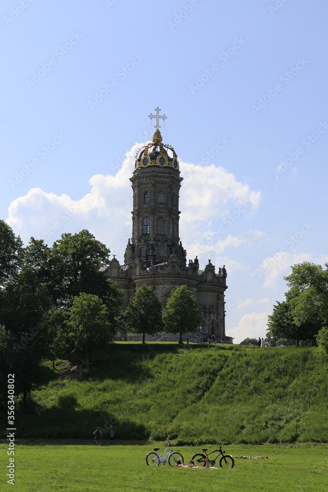 tower of the church build in baroque style and located on the hill