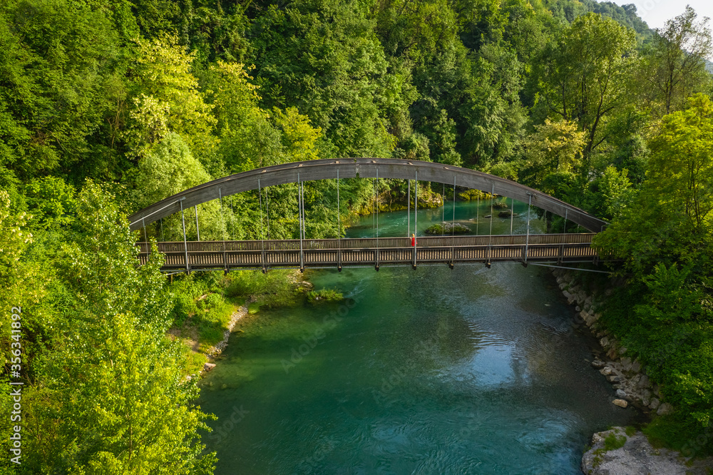 drone view of the Serio river and old bridge, Val Seriana Bergamo.