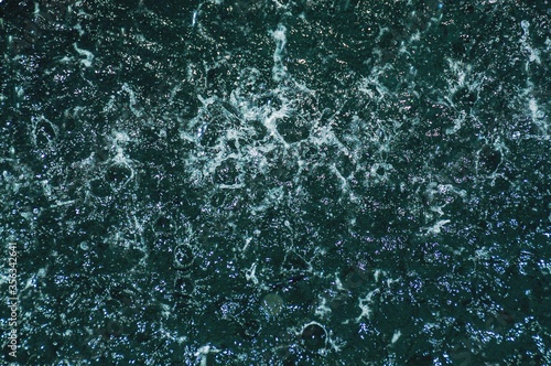 Top view of rain drops falling on the sea during a violent monsoon season