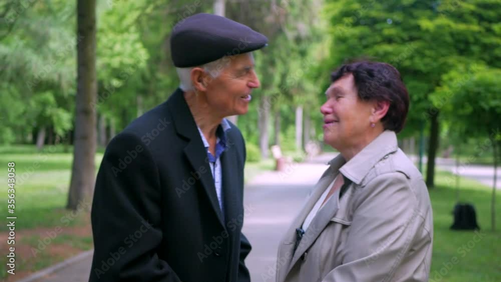 Old couple in love kissing. Grandparents kiss on the lips. Beautiful old man and old woman making love. Old couple in love kissing. Grandparents kiss on the lips. Beautiful old man and old woman making love.