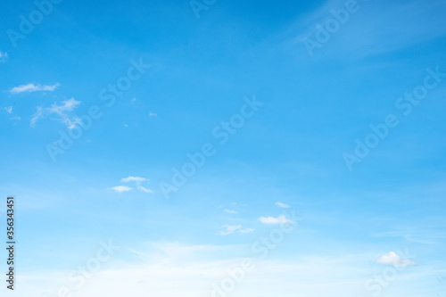 blue sky background with tiny clouds 