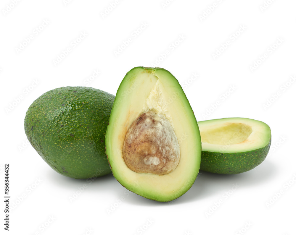 green avocado fruit isolated on white background