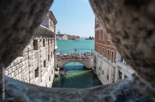 View from The Bridge of Sighs over the canal of Venice, Italy photo