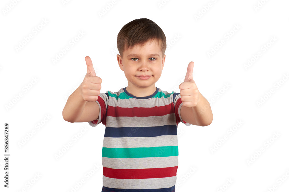 Portrait of attractive young boy, smiling showing thumbs up, on white background. Copy space Portrait of attractive young boy, smiling showing thumbs up, on white background. Copy space