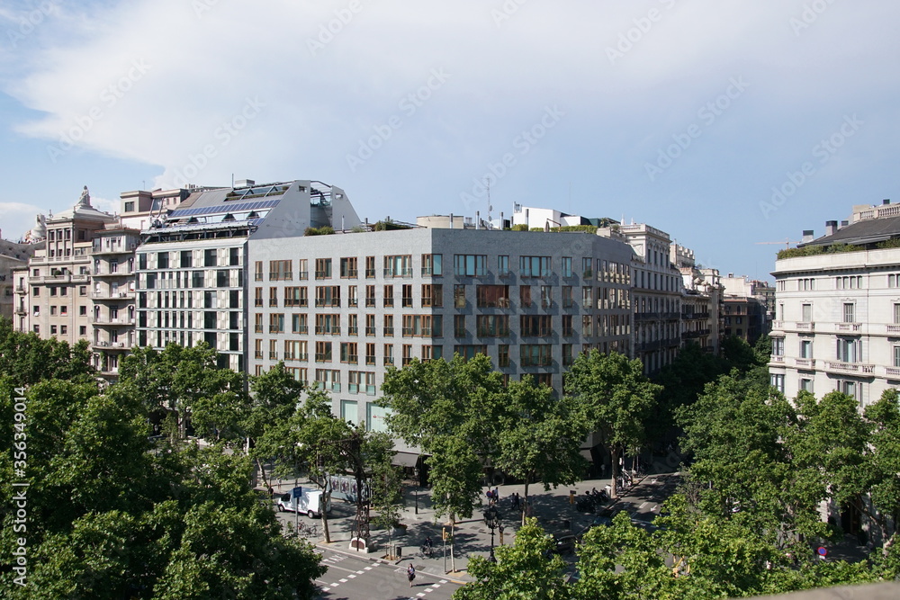 Top view on Gracia avenue with luxurious buildings in Barcelona city