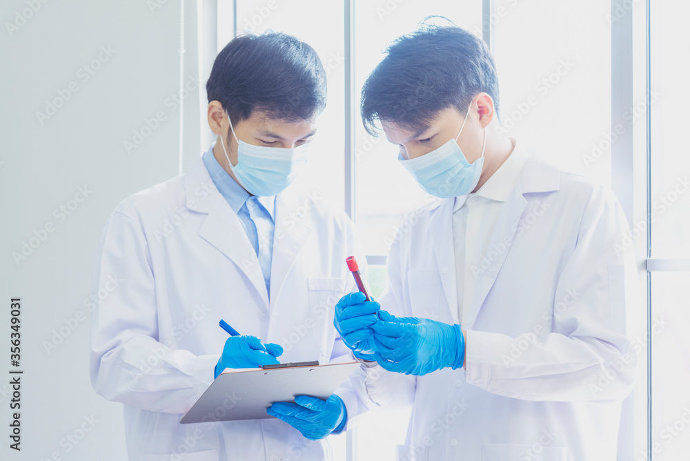 Scientist covid-19 virus antibody research laboratory research experiment biotech cultivate vaccine against virus. Scientist look at microscope experiment lab science test tube Chemistry laboratory Scientist covid-19 virus antibody research laboratory research experiment biotech cultivate vaccine against virus. Scientist look at microscope experiment lab science test tube Chemistry laboratory