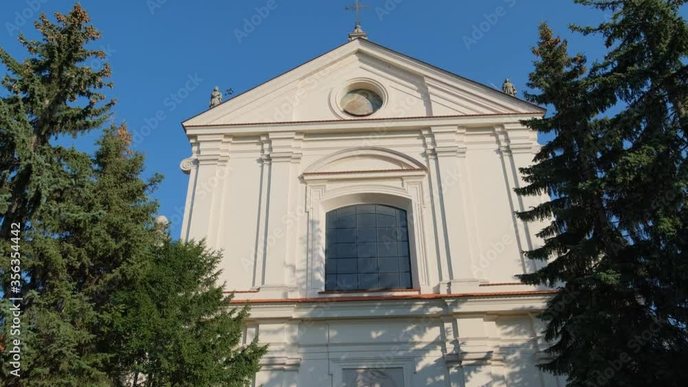 Medium shot of Catholic church on the sunny day.