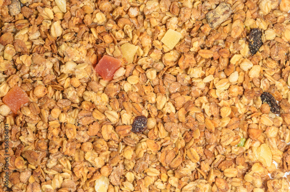 Background from grains of cereals with dry fruits. Muesli texture. Background from grains of cereals with dry fruits. Muesli texture.