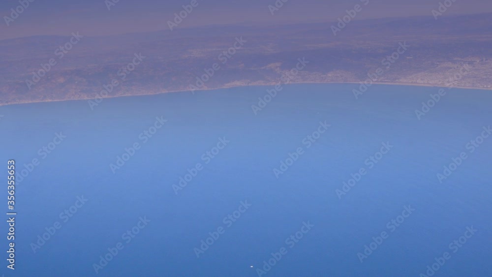 Aerial view of Los Angeles Suburbs and beach coastline California in America USA out from flying airplane window shot in 4k Aerial view of Los Angeles Suburbs and beach coastline California in America USA out from flying airplane window shot in 4k