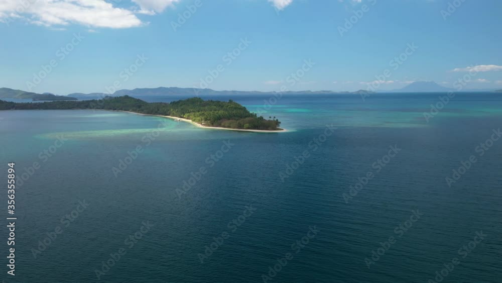 Philippines Seascape. Drone Aerial View of Calm Sea and Island Peninsula With White Sand Beach Philippines Seascape. Drone Aerial View of Calm Sea and Island Peninsula With White Sand Beach
