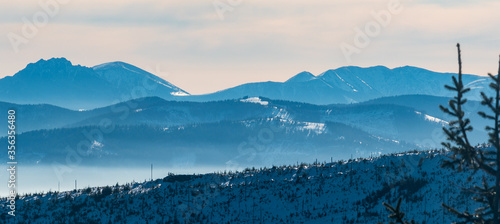 Fototapeta Naklejka Na Ścianę i Meble -  View to Krivanska Mala Fatra mountain range in Slovakia from Magurka Wislanska hill in winter Beskid Slaski mountains in Poland