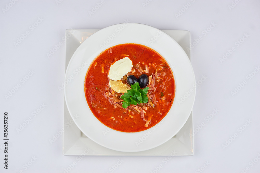 red soup of cabbage and lemon beets and lemon with sour cream red soup of cabbage and lemon beets and lemon with sour cream
