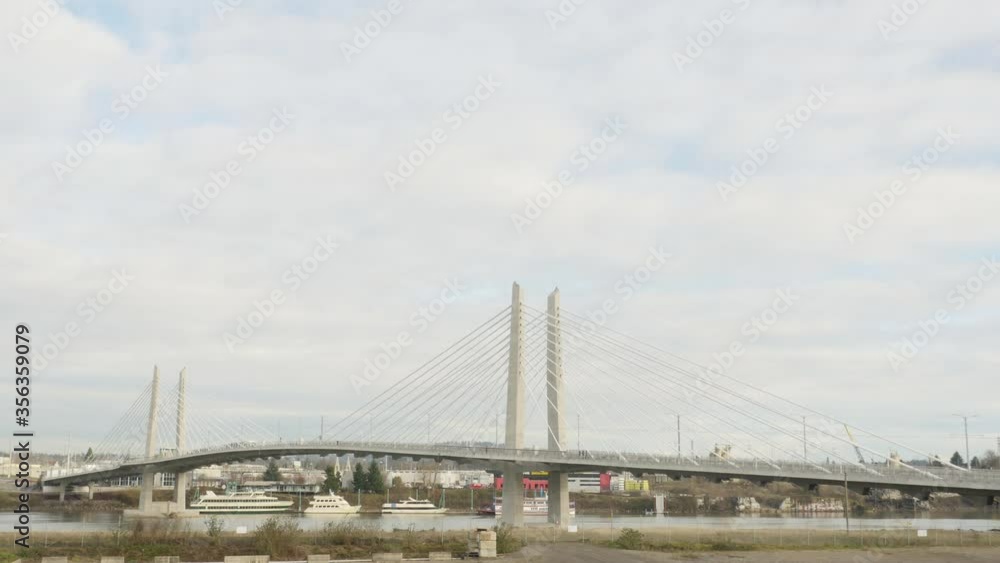 Tilikum Bridge Crossing time lapse with trams and buses in Portland Oregon USA in 4k High Resolution Tilikum Bridge Crossing time lapse with trams and buses in Portland Oregon USA in 4k High Resolution