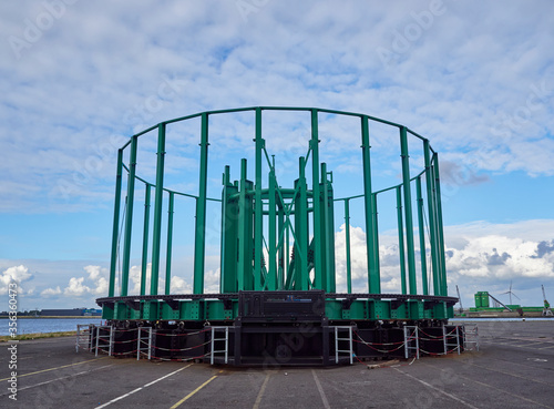 An Empty Rotating Cable drum lies on its side after unloading its Cargo at Den Haag Container Terminal in Amsterdam, The Netherlands. photo