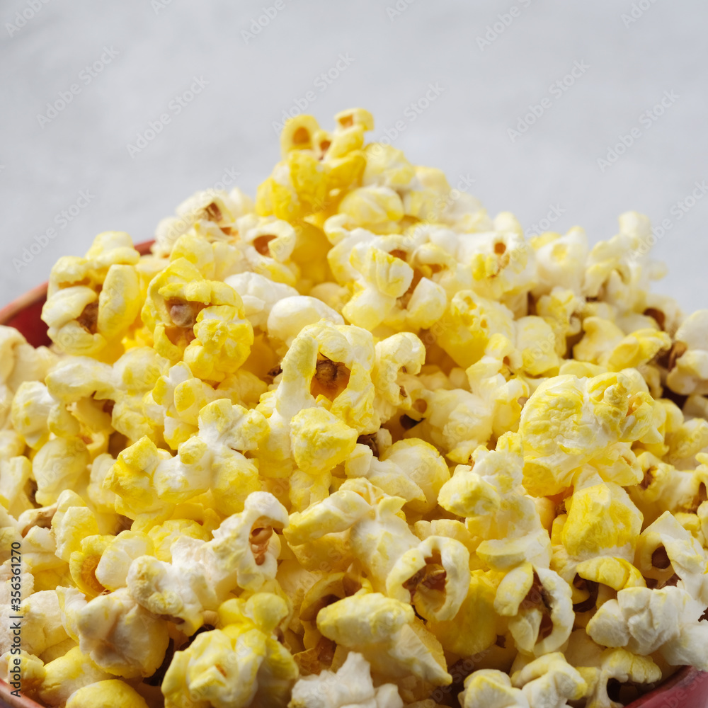 Grains of salted cheese popcorn close-up. Macro shooting