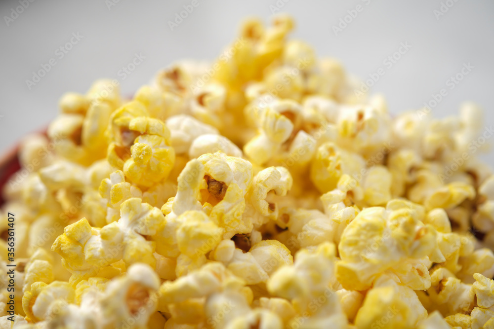 Grains of salted cheese popcorn close-up. Macro shooting Grains of salted cheese popcorn close-up. Macro shooting
