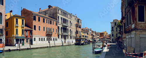 Panoramic summer view of Cannaregio canal with Guglie Bridge. Venice. Italy.