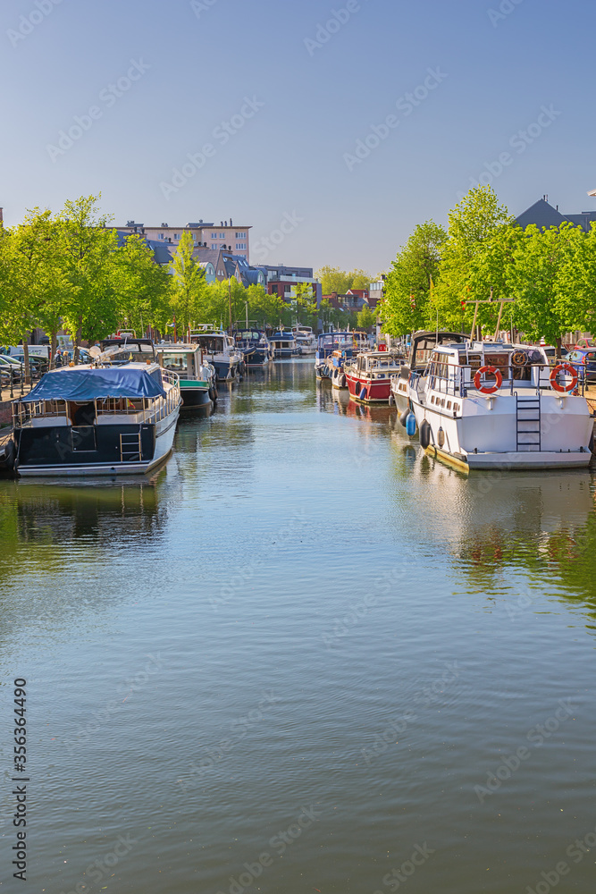 Yachts moored at the salt wharf in Mechelen's city centre Yachts moored at the salt wharf in Mechelen's city centre