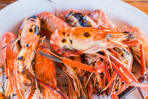 Grilled giant river prawn shrimp bbq food menu popular street seafood in Thailand.