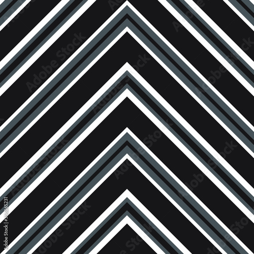 Black and White Chevron Diagonal Stripes seamless pattern background - Black and white Chevron diagonal striped seamless pattern background suitable for fashion textiles, graphics